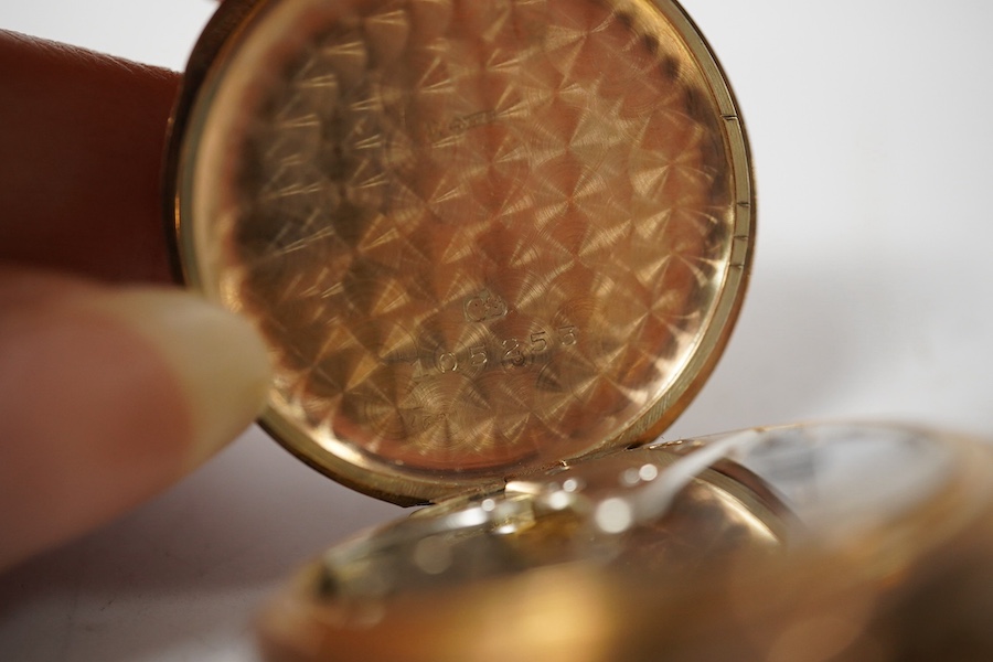 A George V 9ct gold open faced fob watch, with Roman dial and subsidiary seconds(hand loose), with 9ct gold cuvette, case diameter 34mm, gross weight 27.2 grams. Condition - poor to fair